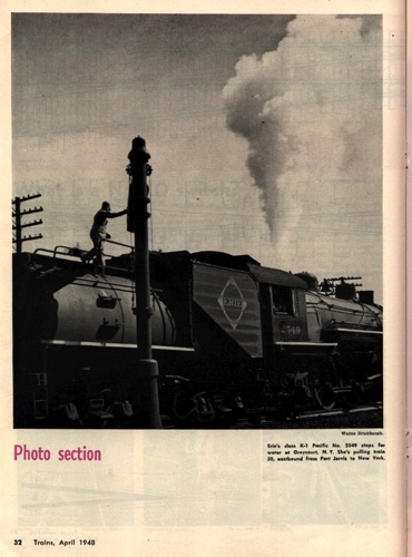Erie's class K-1 Pacific No. 2549 stops for water at Greycourt, N. Y. Published in Trains Magazine, April 1948 Volume 8 Number 6. chs-003940